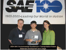 Photo - Our team accepting their SAE Award